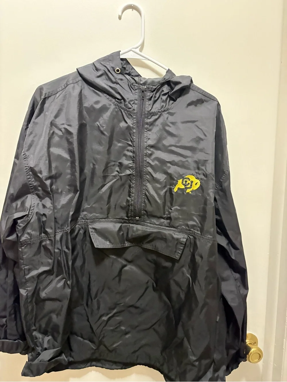 Men's Black Hooded Rain coat with CU Boulder logo.